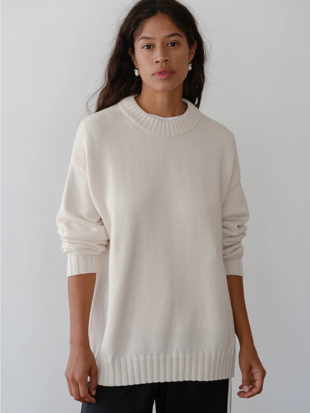 DONNI. Relaxed Crewneck Sweater in Cream